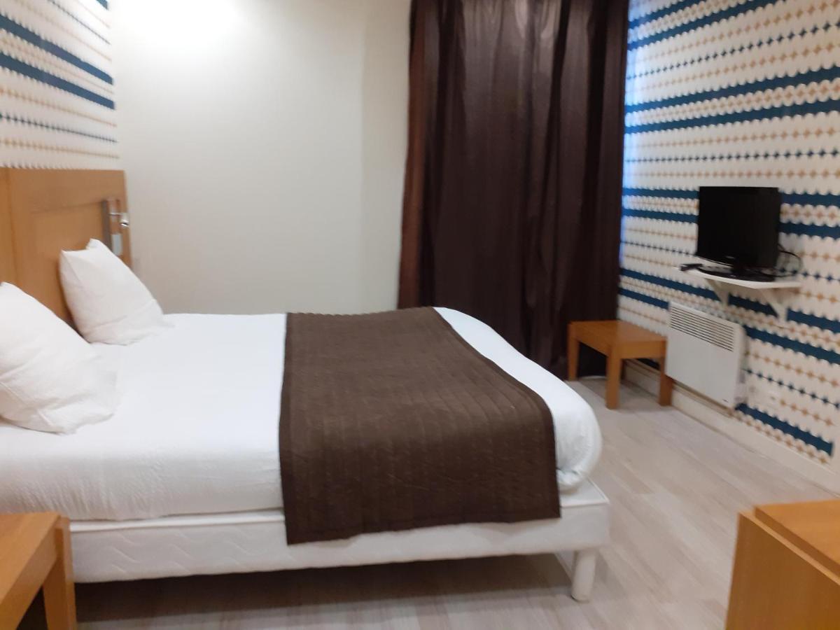 Logis Hotel Restaurant De L'Ecu Монбар Екстер'єр фото